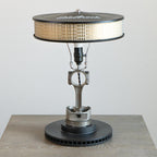 Vintage-style lamp with unique design on a wooden surface
