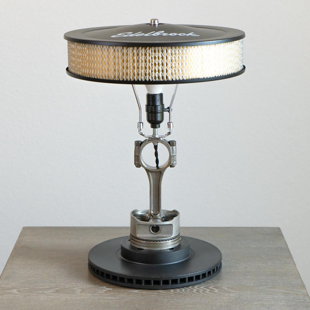 Vintage-style lamp with unique design on a wooden surface