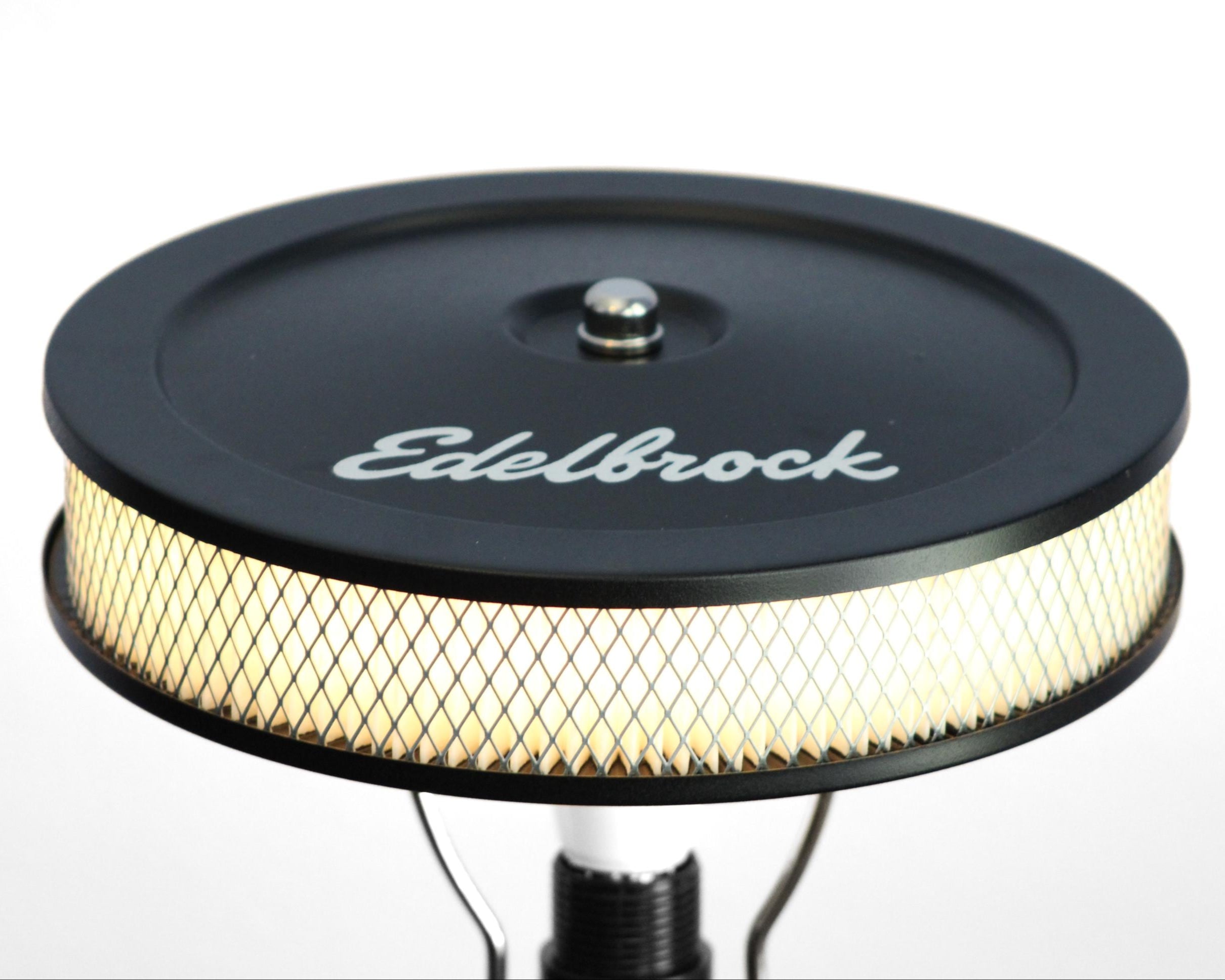 ford car parts lamp crafted from a real piston and gear, offering bold automotive style and functional lighting.