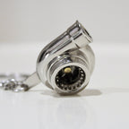 Turbocharger keychain on a white background