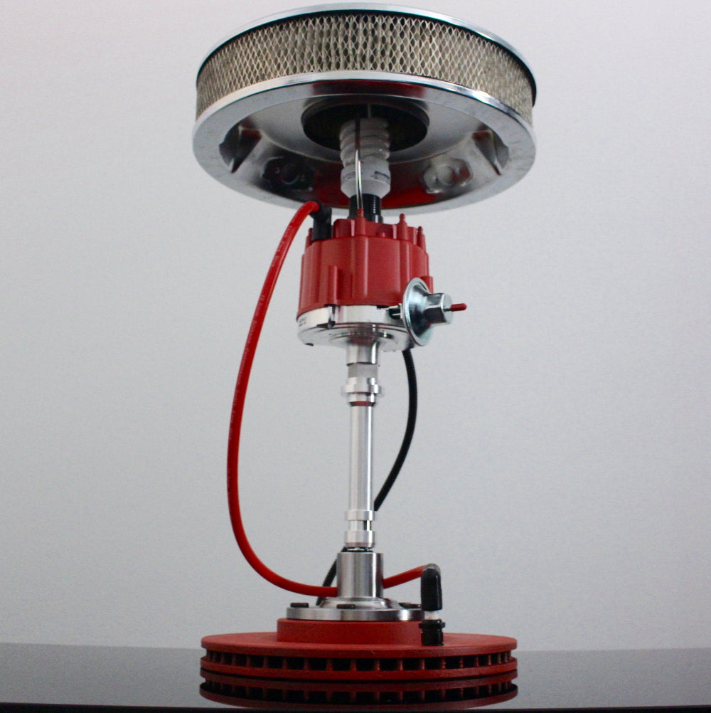 Automotive distributor lamp styled for home decor, combining mechanical detail with warm functional lighting.