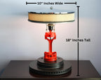 Piston lamp made from real car parts, designed with industrial metal components and functional lighting for automotive-inspired spaces.