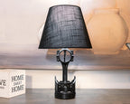 Car parts piston lamp made from a real upcycled piston, offering functional lighting with understated automotive decor appeal.