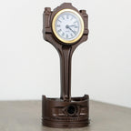 Clear coated Ford piston clock preserving raw metal character.