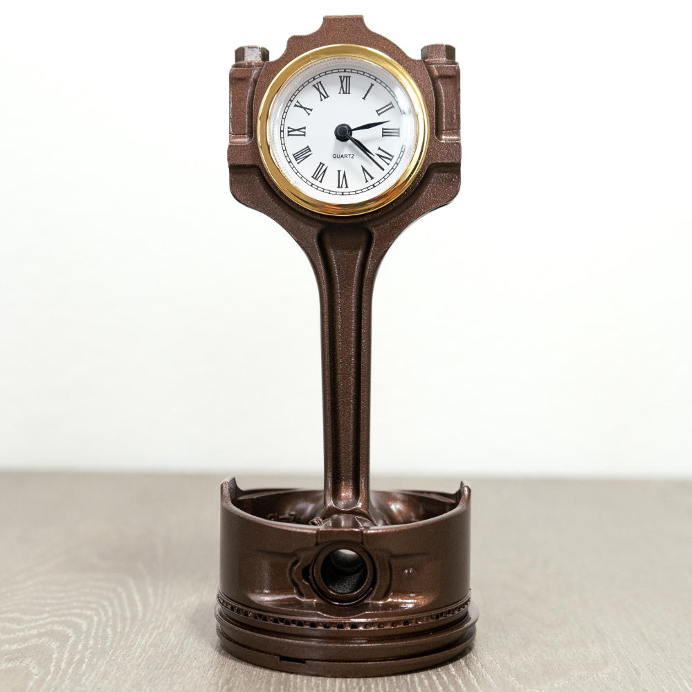 Ford piston clock available in multiple finish colors for personalized style.