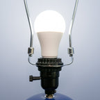 Desk sized STP oil filter lamp designed to fit naturally in offices, garages, and workspaces.