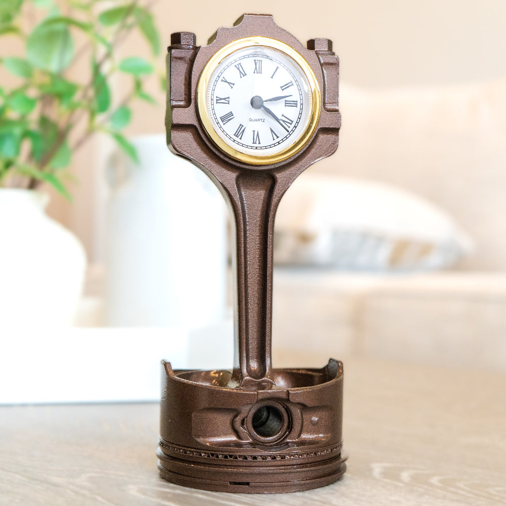 Ford piston clock made from an authentic engine piston with integrated clock face.
