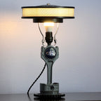 Ford piston lamp handcrafted from real automotive components, combining industrial metal design with functional lighting.