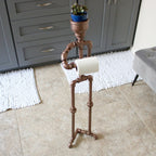 Freestanding toilet paper holder with compact footprint and sturdy structure.