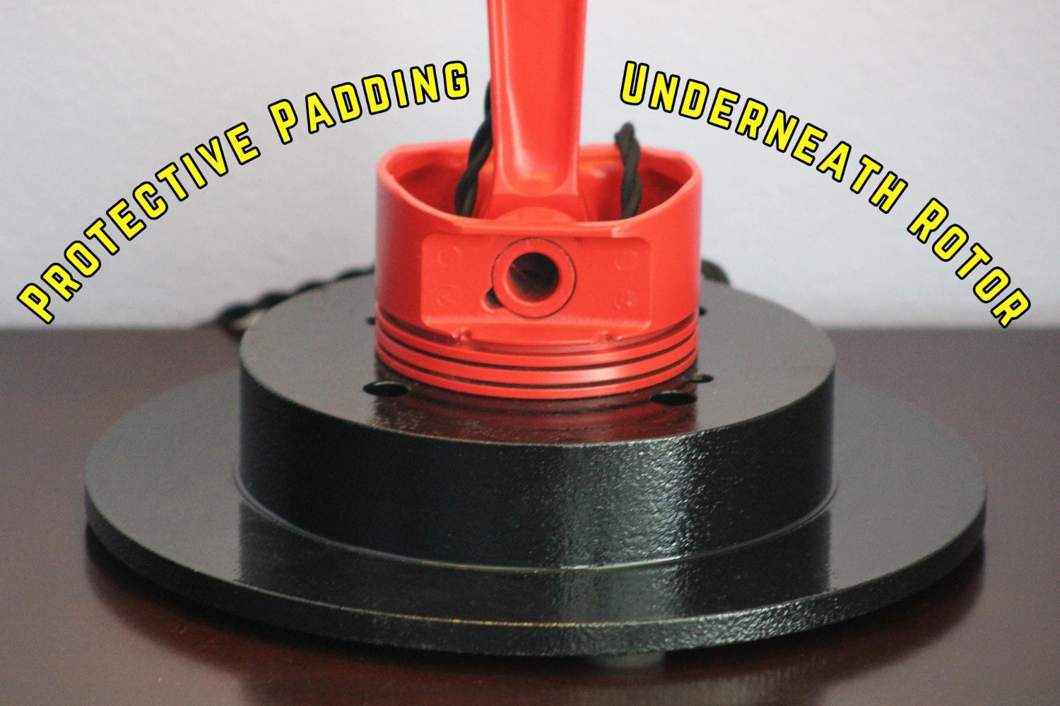 Car parts lamp made from real automotive components, built for garages and man caves with durable metal lighting design.