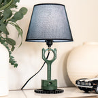 green piston table lamp designed to match home decor while preserving real engine detail.