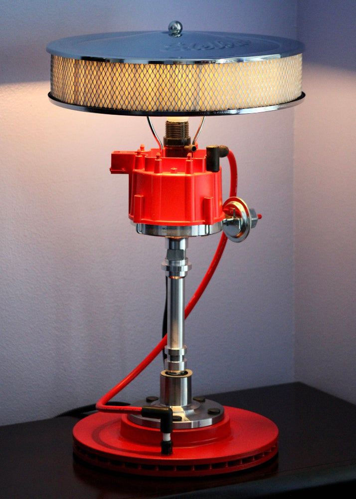 Handcrafted automotive distributor lamp built one at a time using real car parts for unique home or office lighting.
