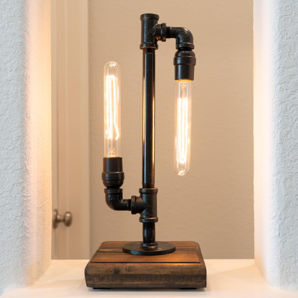 Handcrafted pipe light assembled individually for unique character and long lasting use.