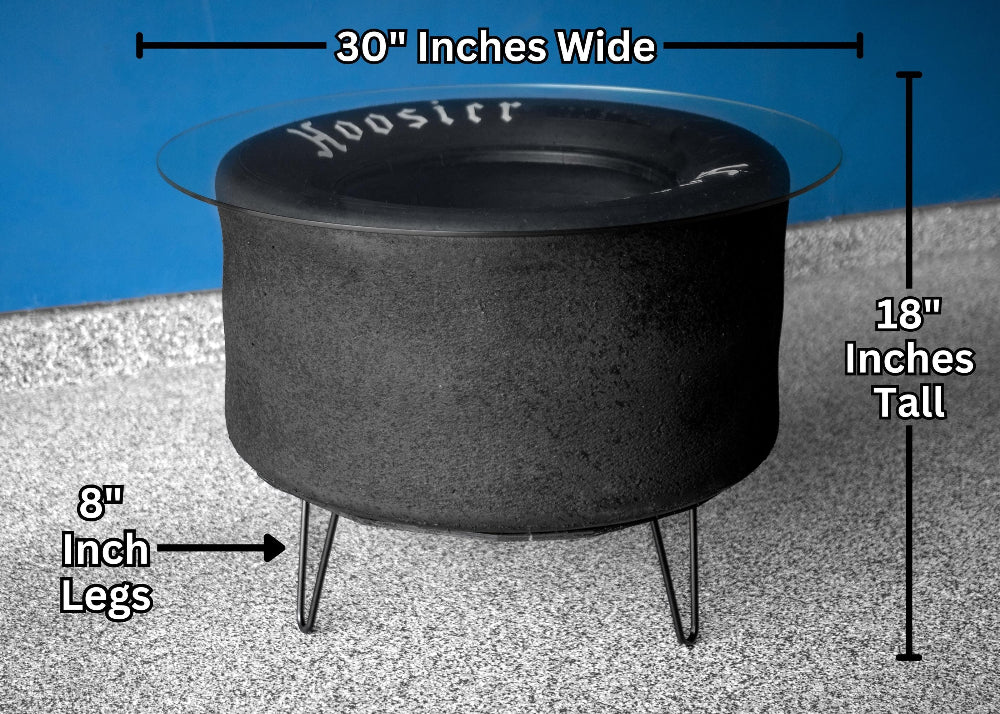 Hoosier tire coffee table designed for man caves and game rooms, made from a retired racing tire with authentic character.