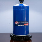 Mechanic style oil filter lamp repurposed from real car parts into functional decor.