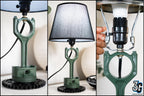 Modern automotive piston lamp that blends clean interior design with mechanical structure.