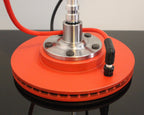 Muscle car lamp constructed with an upcycled brake rotor base and authentic distributor components.
