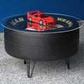 NASCAR tire coffee table made from a real Goodyear racing tire with durable tabletop surface.