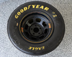 NASCAR wheel and tire table built from authentic racing components, offering unique automotive furniture with racing character.