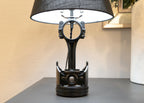 Piston table lamp crafted from a real car piston, featuring understated automotive character and everyday usability.