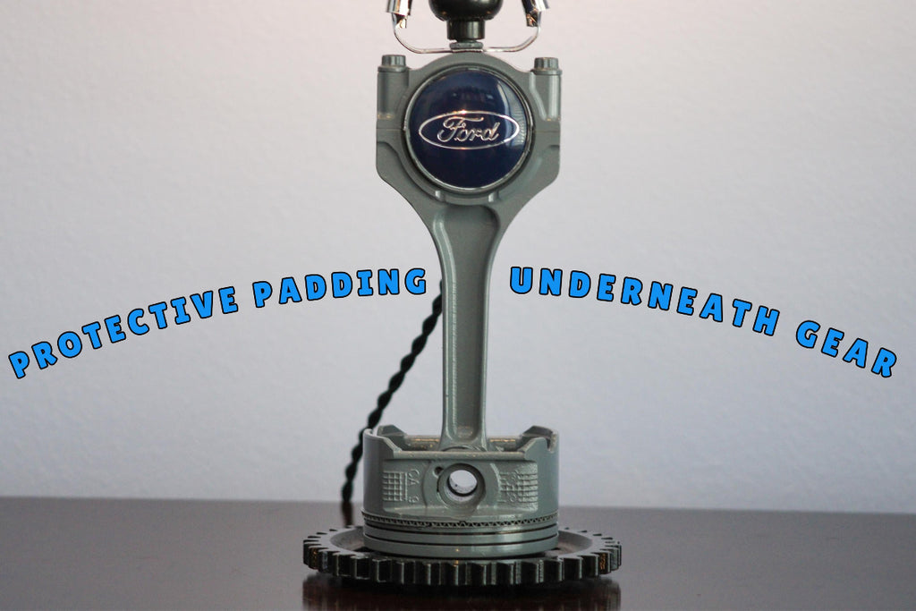 Piston lamp built from real car parts with brand new air filters and logos, combining clean details with automotive style.