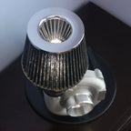 Custom turbocharger lamp made from real car parts, offering durable metal construction and authentic automotive lighting design.