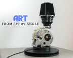 Turbocharger lamp made from real car parts, featuring metal automotive components and integrated lighting for bold interior decor.