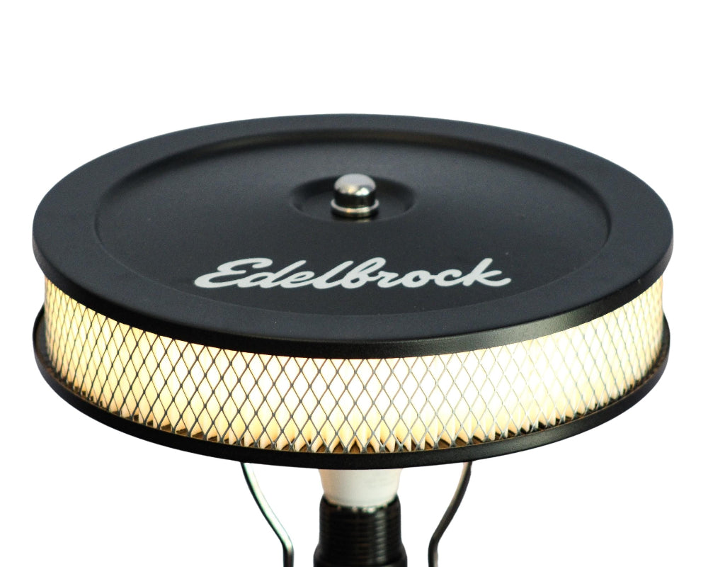 One of a kind Ford piston lamp made from an original V8 engine part, combining Ford history with functional lighting.