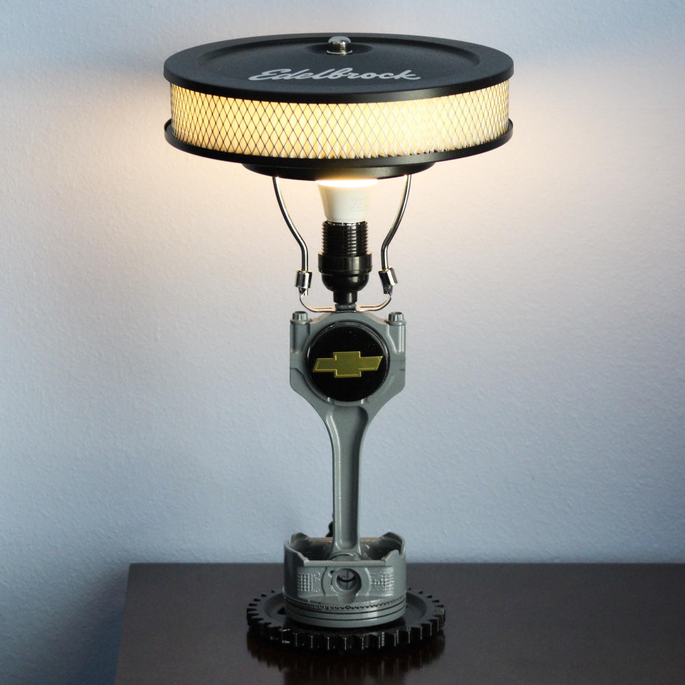 great gift for car guy. Ford piston lamp handcrafted from real car parts, combining automotive craftsmanship with functional lighting.